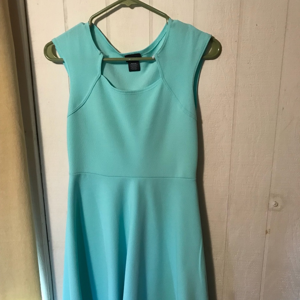 medium sized. mint blue medium length dress.